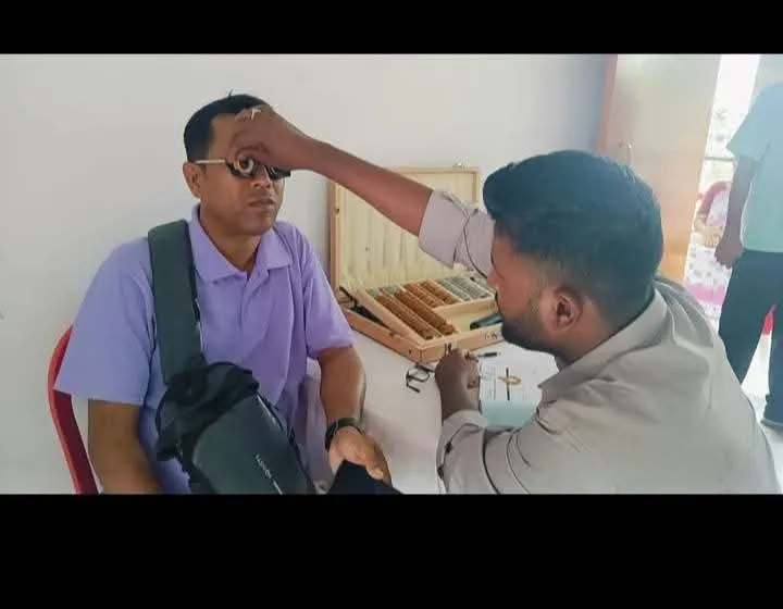 Refraction testing and vision chart diagnostic check.